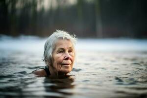 ai généré personnes âgées femme nager dans Extérieur du froid étang l'eau. produire ai photo