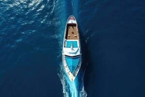 ai généré aérien vue de une luxe yacht voile dans le Profond bleu mer, aérien Haut vers le bas vue de une croisière navire arc en voyageant plus de bleu océan, ai généré photo