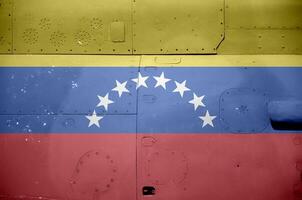 Venezuela drapeau représenté sur côté partie de militaire blindé hélicoptère fermer. armée les forces avion conceptuel Contexte photo