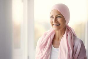 ai généré content cancer patient. souriant femme après chimiothérapie traitement à hôpital oncologie département. Sein cancer récupération. Sein cancer survivant. souriant chauve femme avec rose foulard. photo