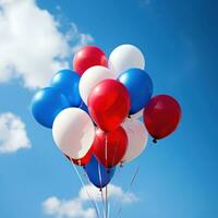 ai généré des ballons dans patriotique couleurs flottant contre une brillant bleu ciel photo