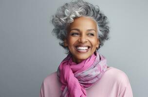 ai généré une souriant Afro-américain femme portant rose écharpe photo