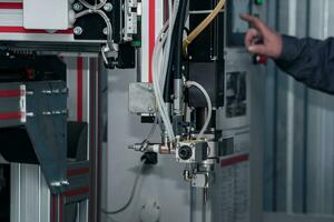 industriel robotique dosage distributeur machine, distribution système robot avant travail photo