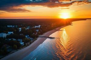 ai généré aérien vue de le le coucher du soleil plus de le plage photo