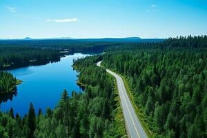 ai généré aérien vue de une route dans le milieu de le forêt photo