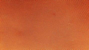 fond de texture de tissu en nylon orange.