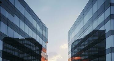 ai généré deux moderne bâtiments avec verre les fenêtres. architecture conception de bâtiments. ai généré photo