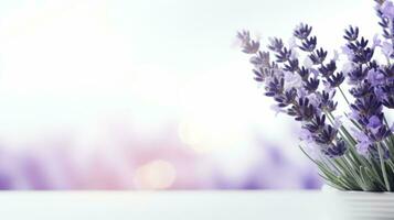 ai généré une bouquet de lavande fleurs sur une blanc surface avec une flou Contexte. photo