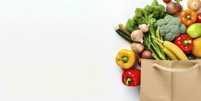 ai généré en bonne santé nourriture dans papier sac des légumes et des fruits sur blanc Contexte. ai généré photo