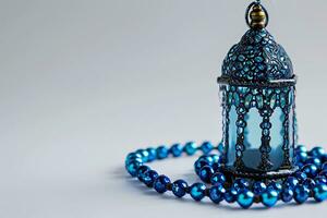 ai généré ornemental arabe lanternes. avec tasbeeh sur le table photo