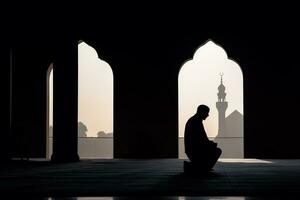 ai généré silhouette musulman homme prier n le mosquée photo