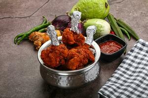 Indien cuisine vitré poulet sucette photo