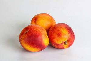 mûr sucré juteux Frais rouge nectarines photo