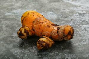 Frais curcuma racine pour cuisine photo