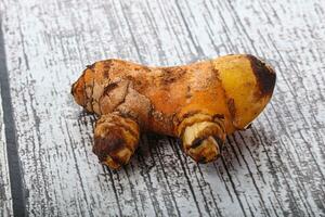 Frais curcuma racine pour cuisine photo