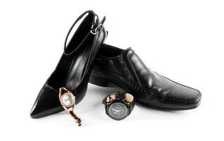 Masculin et femelle des chaussures avec montres photo