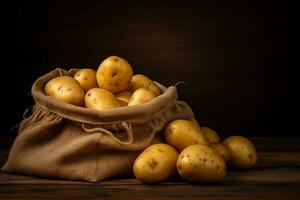 potayos près une toile de jute sac sur une en bois tableau. photo