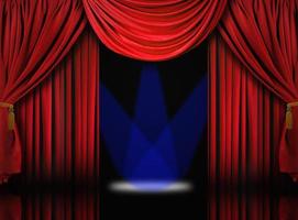 rideaux de velours de scène de théâtre avec des projecteurs bleus photo