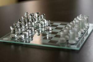 proche en haut coup de le échecs planche fabriqué de verre, des sports photo