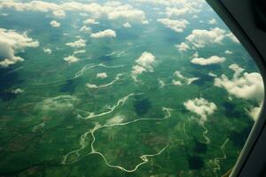 ai généré avion fenêtre la perspective aérien photo de nuage embrassé vert des champs