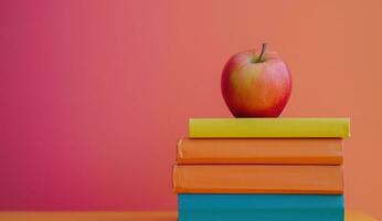 ai généré Pomme sur une empiler de livres éducation photo