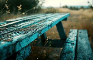 ai généré une en bois pique-nique table dans milieu de une champ photo