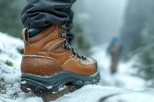 ai généré trekking bottes sur le pieds de une promeneur en marchant par le hiver montagnes, fermer photo