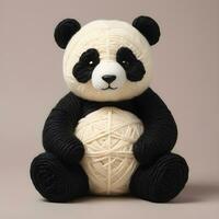 ai généré mignonne duveteux Panda fabriqué de fil photo