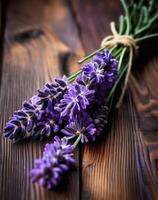 ai généré bouquet de lavande fleurs sur en bois arrière-plan, sélectif se concentrer. photo