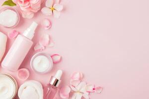 ai généré plat allonger composition avec cosmétique des produits et rose fleurs sur rose Contexte photo