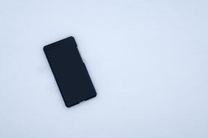 tour de Vide afficher téléphone intelligent chute sur neige photo