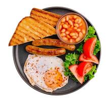 Anglais petit déjeuner sur noir la poêle Haut vue photo