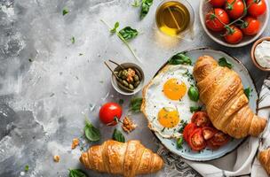 ai généré petit déjeuner des croissants, œufs, tomate, et fromage plat disposition photo