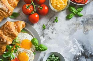 ai généré petit déjeuner des croissants, œufs, tomate, et fromage plat disposition photo