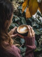 ai généré une femme tête est en portant une café tasse avec blanc moussant café plus de plante photo