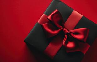 ai généré noir boîte avec cadeau enveloppé dans rouge sur une rouge Contexte photo