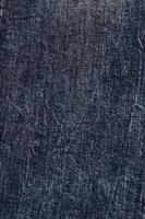 gros plan de tissu denim, gros plan de texture jeans foncé photo