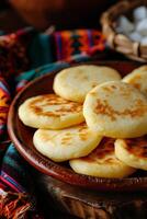 ai généré blé crêpe délice traditionnel colombien arepas de choclo photo