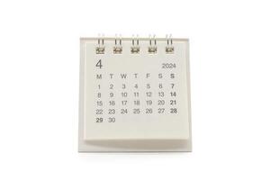 Facile bureau calendrier pour avril 2024 isolé sur blanc Contexte. calendrier concept avec copie espace. photo