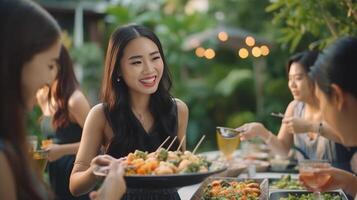 ai génératif content asiatique femme en buvant rouge du vin séance à restaurant à manger table groupe de copains ayant un barbecue dîner fête à l'extérieur nourriture et boisson mode de vie concept photo