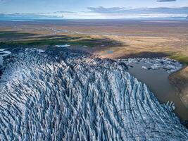 svnafellsjkull glacier dans Islande. Haut voir. skaftafell nationale parc. la glace et cendres de le volcan texture paysage, magnifique la nature la glace Contexte de Islande photo