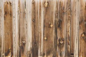 Ancienne surface de planches de bois gris brunâtre patiné à sec - fond et texture plein cadre photo