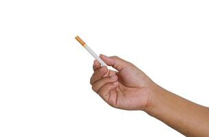 dépôt une cigarette dans main sur blanc Contexte photo