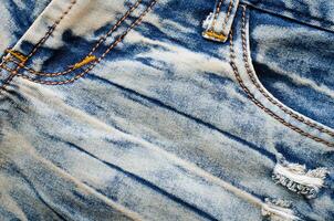 les rides bleu jeans texture. jeans Contexte. photo