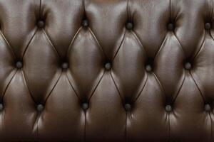 proche en haut rétro chesterfield style, marron capitonné textile Contexte photo