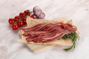 brut du boeuf Bacon pour cuisine photo