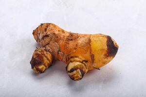 Frais curcuma racine pour cuisine photo