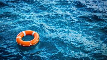 ai généré l'eau sécurité, Orange bouée de sauvetage flottant dans le bleu mer photo