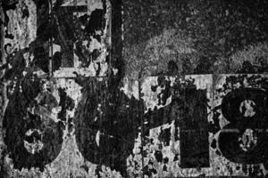 vieux peeling ancien affiches sur grunge béton mur texture Contexte. photo