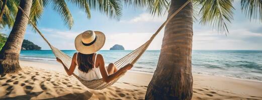 ai généré femme relaxant dans une hamac entre paume des arbres sur une plage. une la personne avec Soleil chapeau mensonges dans une hamac lié entre deux paume des arbres sur une tropical sablonneux plage. photo